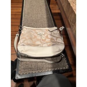 Coach Park Signature Duffle crossbody bag.